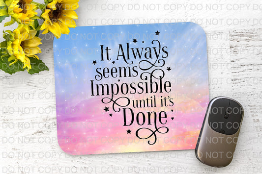 a mouse pad with a quote on it