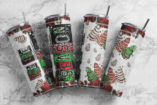 a group of christmas themed tumblers sitting on top of a marble counter